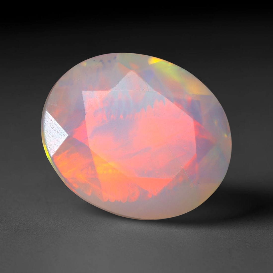 2.78Ct Natural Ethiopian Opal, Faceted Cut - 12.1x10.1x5.7 mm , 682C: No Reserve Gems Auction Subject: Natural Ethiopian Welo Opal Origin: Ethiopia Treatment: Unheated