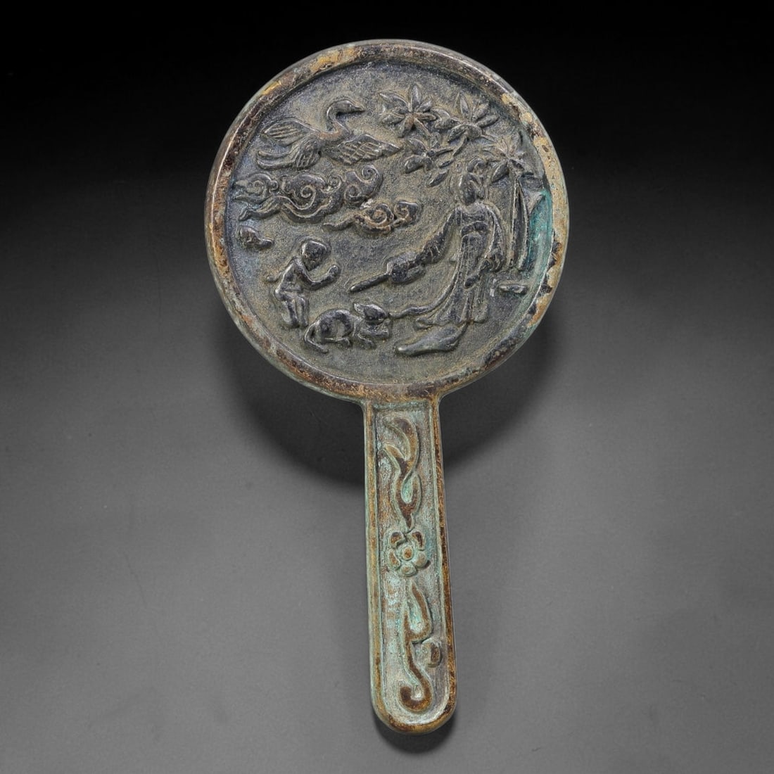 A Chinese Bronze Hand-Held Figural Story Mirror, 59AD (1 of 2)