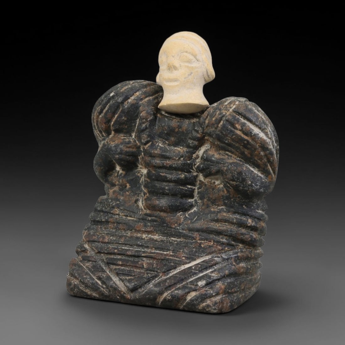 Ancient Greco-Bactrian Stone Idol (250 BCE-200 CE), 66AK: This antique stone idol originates from the Greco-Bactrian Cultures of Central Asia, representing a characteristic sculptural tradition blending Iranian and Hellenistic artistic influences for devotio