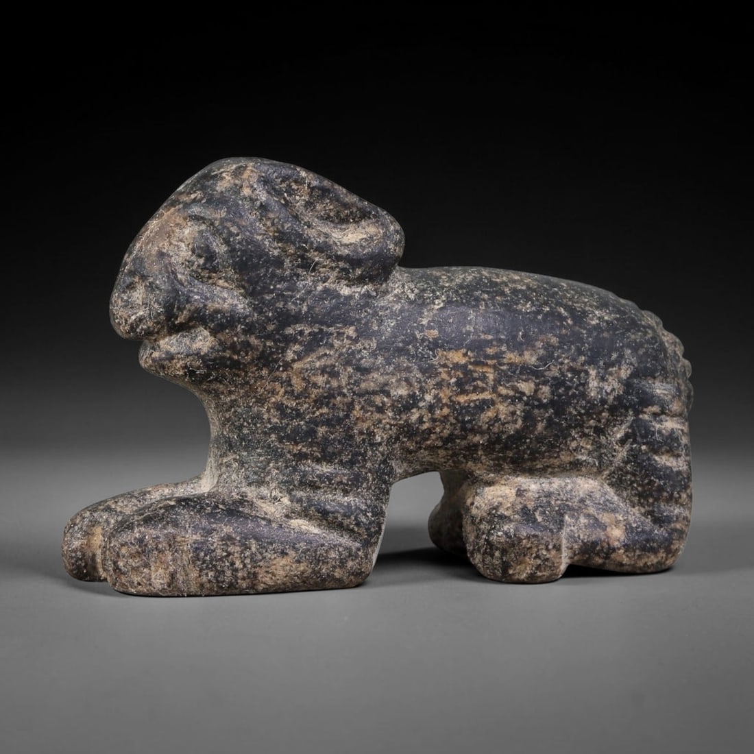 Ancient Sasanian Persian Stone Zoomorphic Amulet (224-651 CE), 78AJ: This ancient stone zoomorphic amulet originates from the Sasanian Persian Empire, carved as a protective animal-form talisman reflecting late antique Iranian apotropaic stone-carving customs. The figu