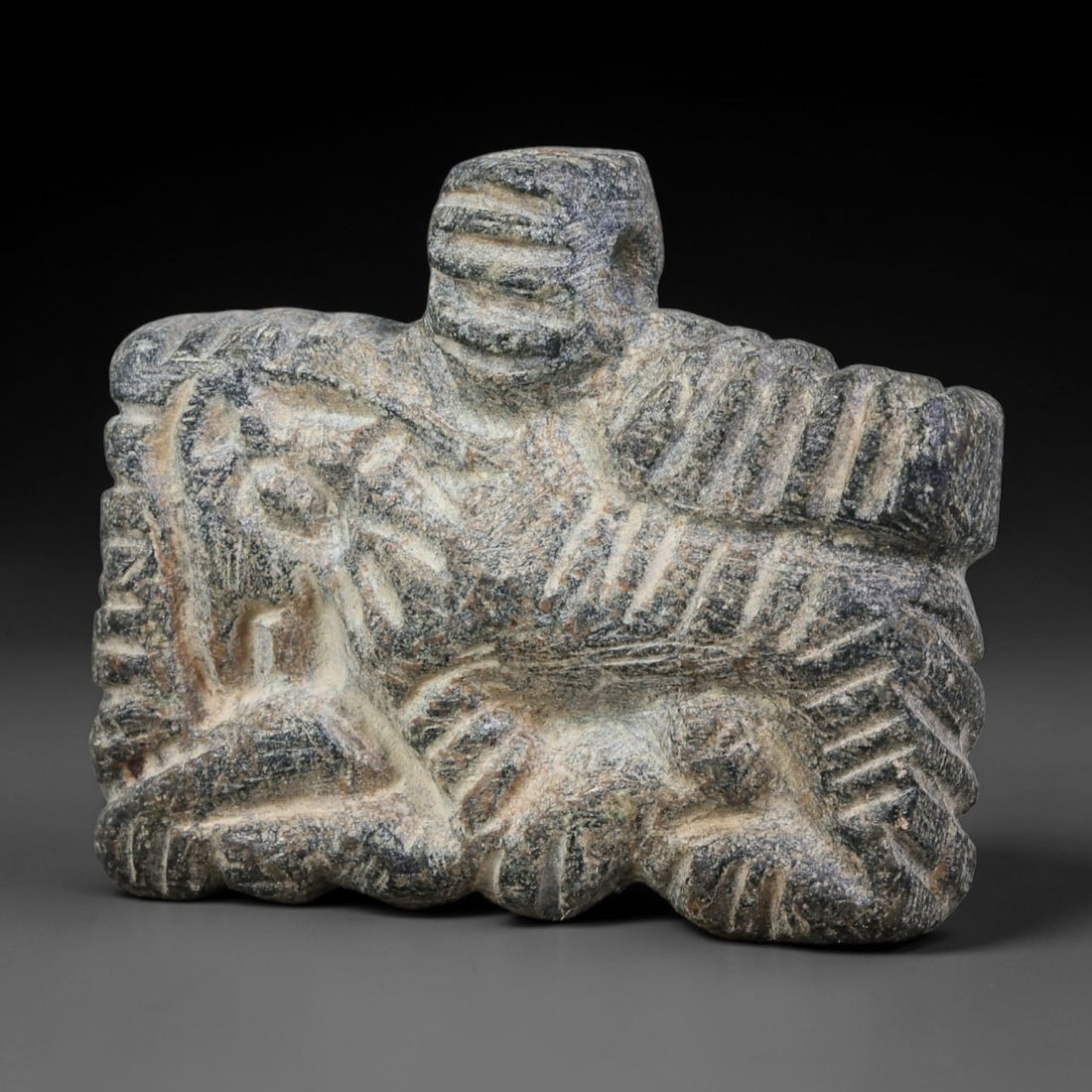 Ancient Elamite Civilization Relief-Carved Stone Tablet Pendant Amulet (3200-539 BCE), 82AJ: This ancient relief-carved stone tablet pendant amulet originates from Elamite Civilization, functioning as a wearable apotropaic talisman within Southwest Iranian ancient ritual traditions. The flat 