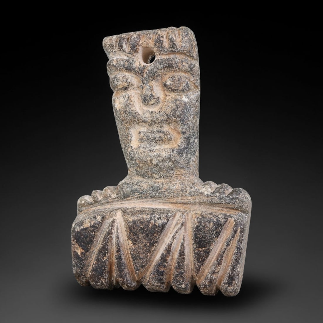 Ancient Sasanian Persian Anthropomorphic Stone Idol Pendant Amulet (224-651 CE), 85AJ: This ancient anthropomorphic stone idol pendant amulet originates from the Sasanian Persian Empire, serving as a wearable apotropaic talisman embodying late-antique Iranian votive stone-carving tradit