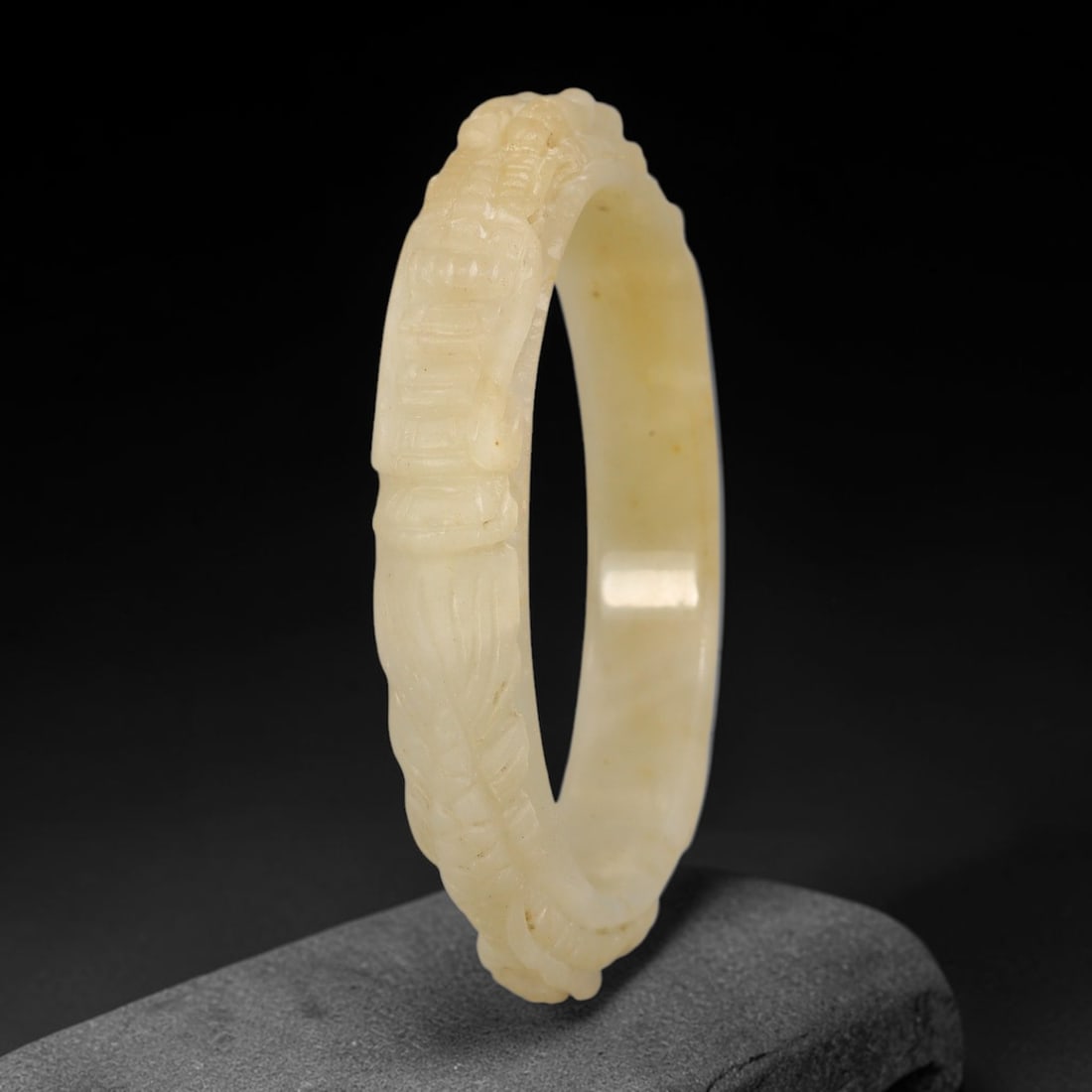 Natural Burmese Type A Jadeite Jade Carving Bangle Bracelet, 69AL: Natural Burmese Type A jadeite jade carved bangle bracelet, inner diameter 58mm, featuring continuous relief decorative carving across the band. This solid bangle displays natural stone inclusions and