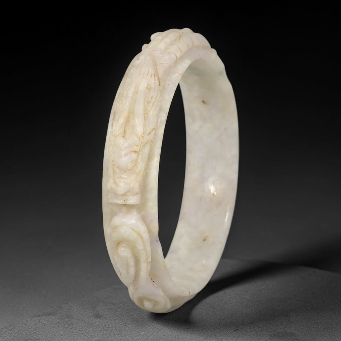 Natural Burmese Type A Jadeite Jade Carving Bangle Bracelet, 72AL: Natural Burmese Type A jadeite jade carved bangle bracelet, inner diameter 58mm, featuring continuous relief decorative carving across the band. This solid bangle displays natural stone inclusions and