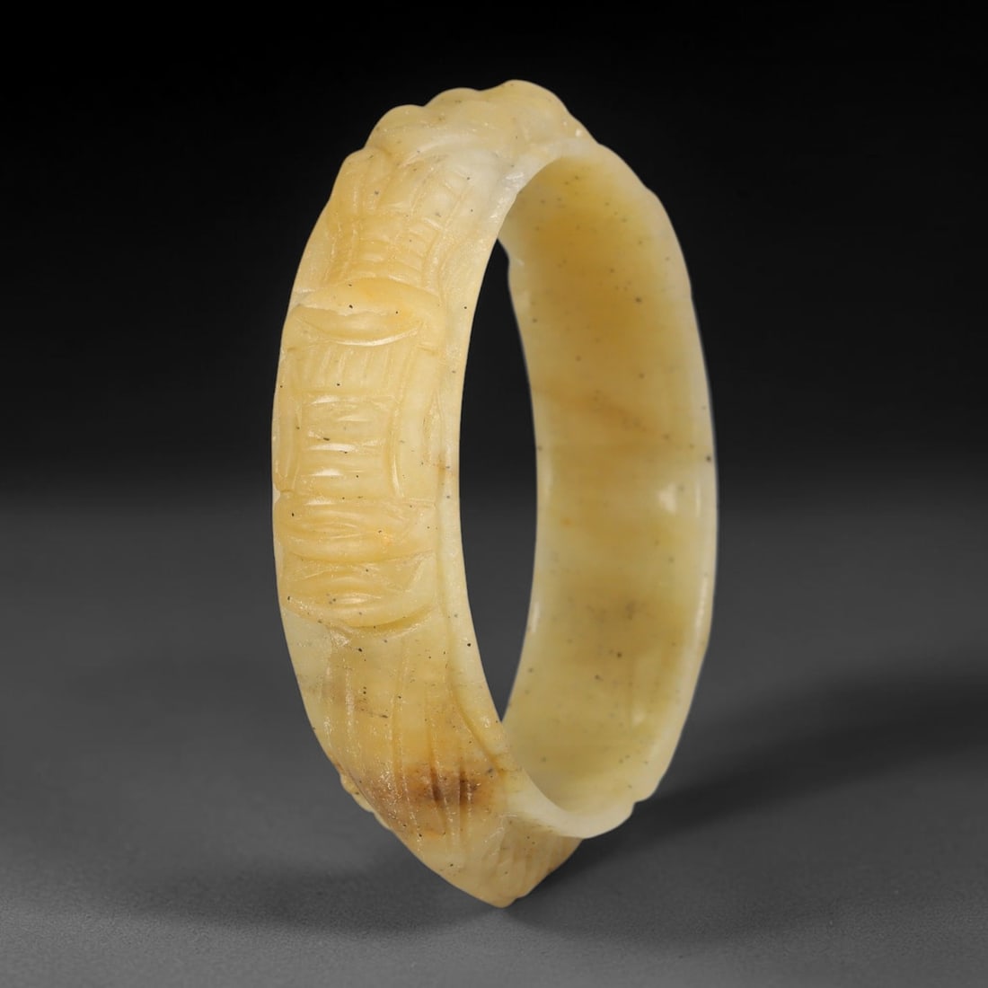 Natural Burmese Type A Jadeite Jade Carving Bangle Bracelet, 74AL: Natural Burmese Type A jadeite jade carved bangle bracelet, inner diameter 59mm, featuring continuous relief decorative carving across the band. This solid bangle displays natural stone inclusions and