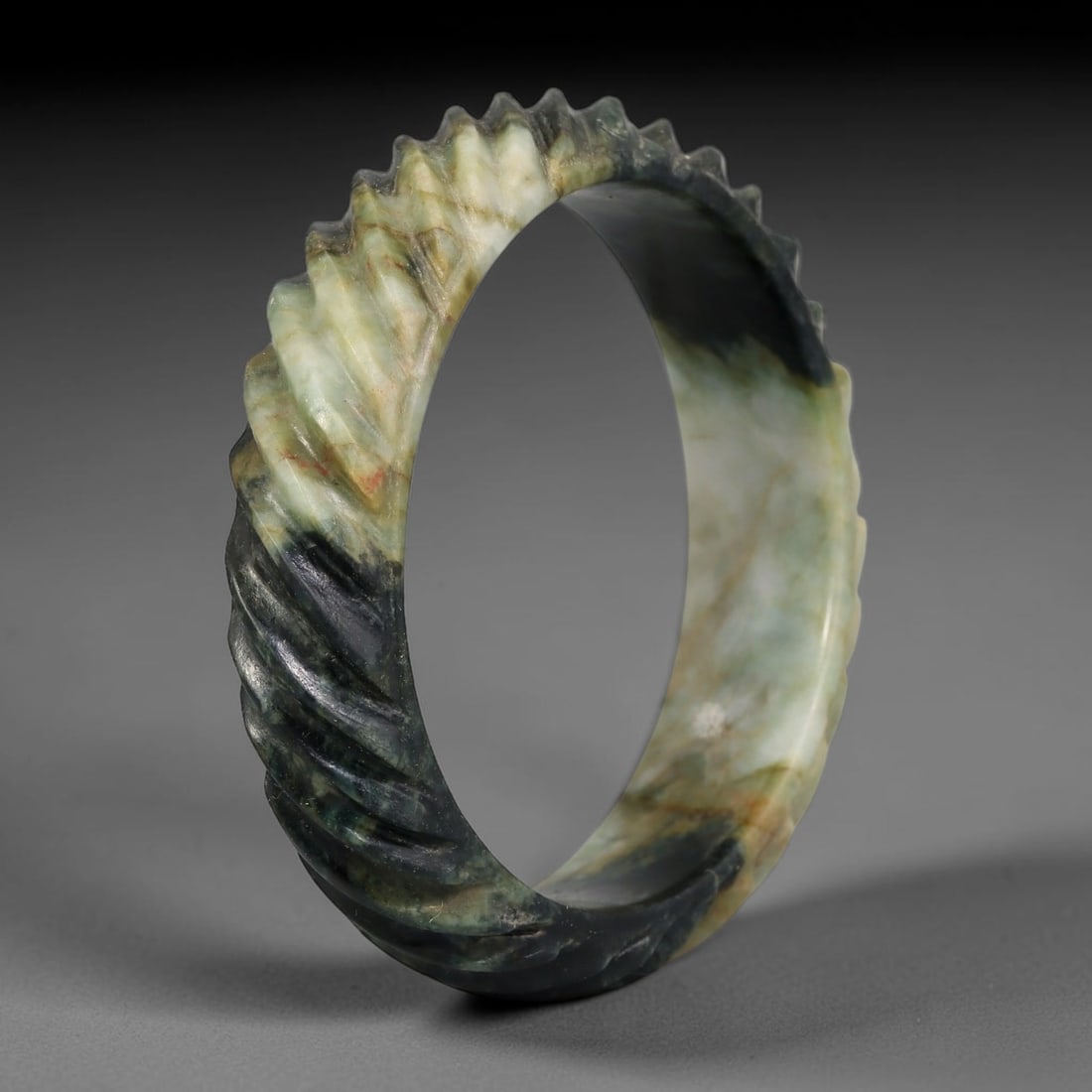Natural Burmese Type A Jadeite Jade Carving Bangle Bracelet, 76AL: Natural Burmese Type A jadeite jade carved bangle bracelet, inner diameter 60mm, featuring continuous relief decorative carving across the band. This solid bangle displays natural stone inclusions and