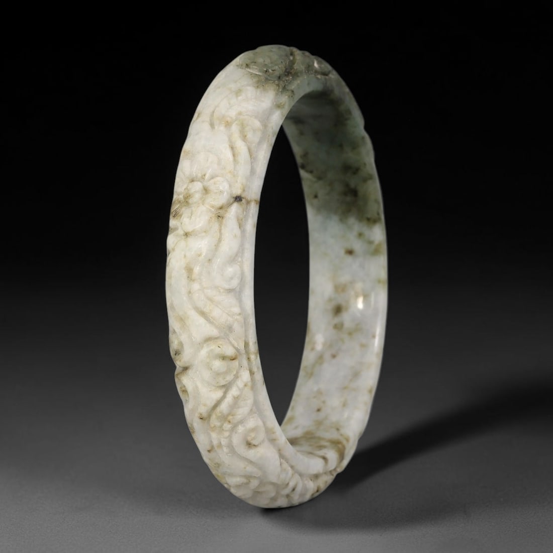 Natural Burmese Type A Jadeite Jade Carving Bangle Bracelet, 68AL: Natural Burmese Type A jadeite jade carved bangle bracelet, inner diameter 59mm, featuring continuous relief decorative carving across the band. This solid bangle displays natural stone inclusions and
