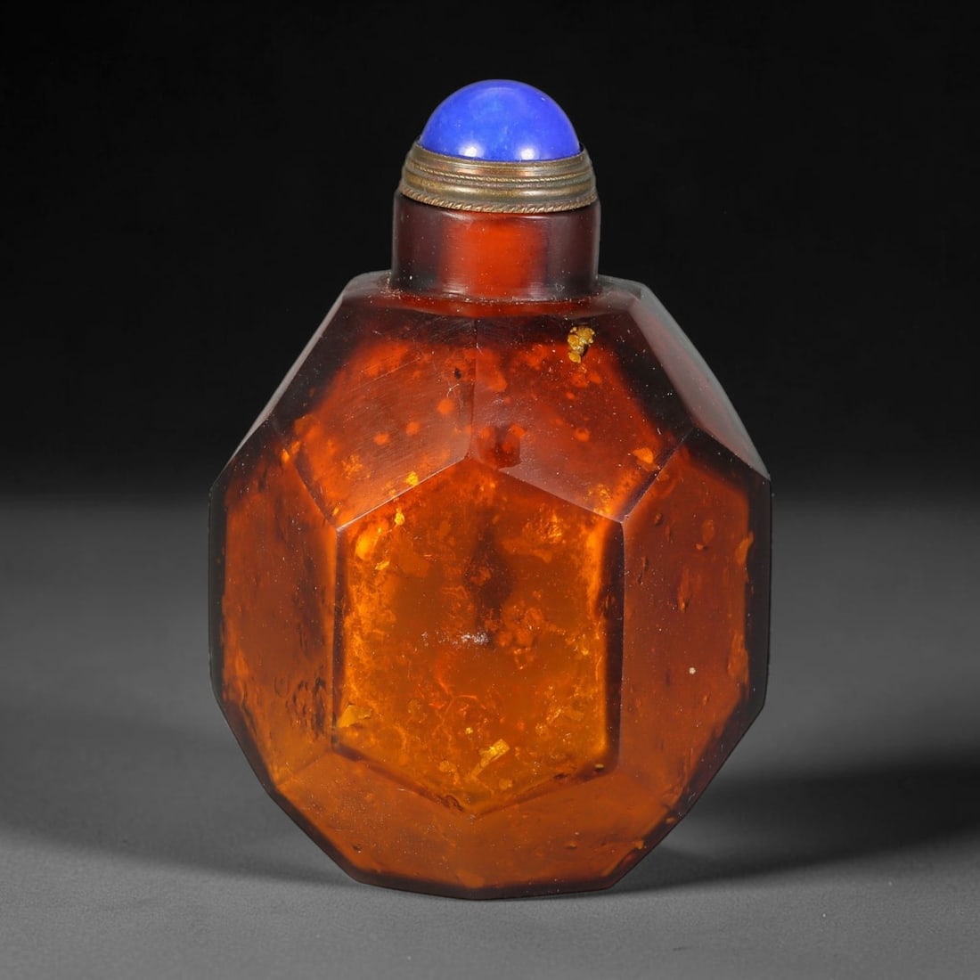 A Chinese Faceted Amber Glass Snuff Bottle, 13AV (1 of 2)