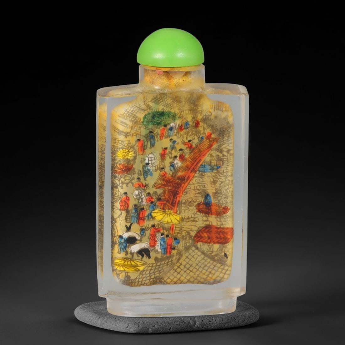 A Chinese Inside Painted Riverside Scene at Qingming Festival Glass Snuff Bottle, 99AL: Rectangular clear glass snuff bottle featuring fine interior painting depicting scenes from Riverside Scene at Qingming Festival on both sides. The composition captures bustling ancient street life wi