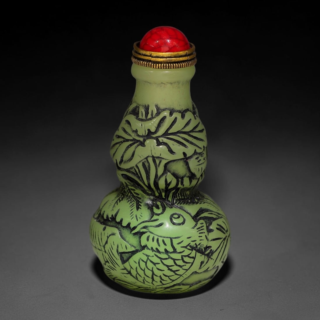 A Chinese Phosphorescent Green Gourd Form Relief Carved Carp Snuff Bottle, 85AV (1 of 2)