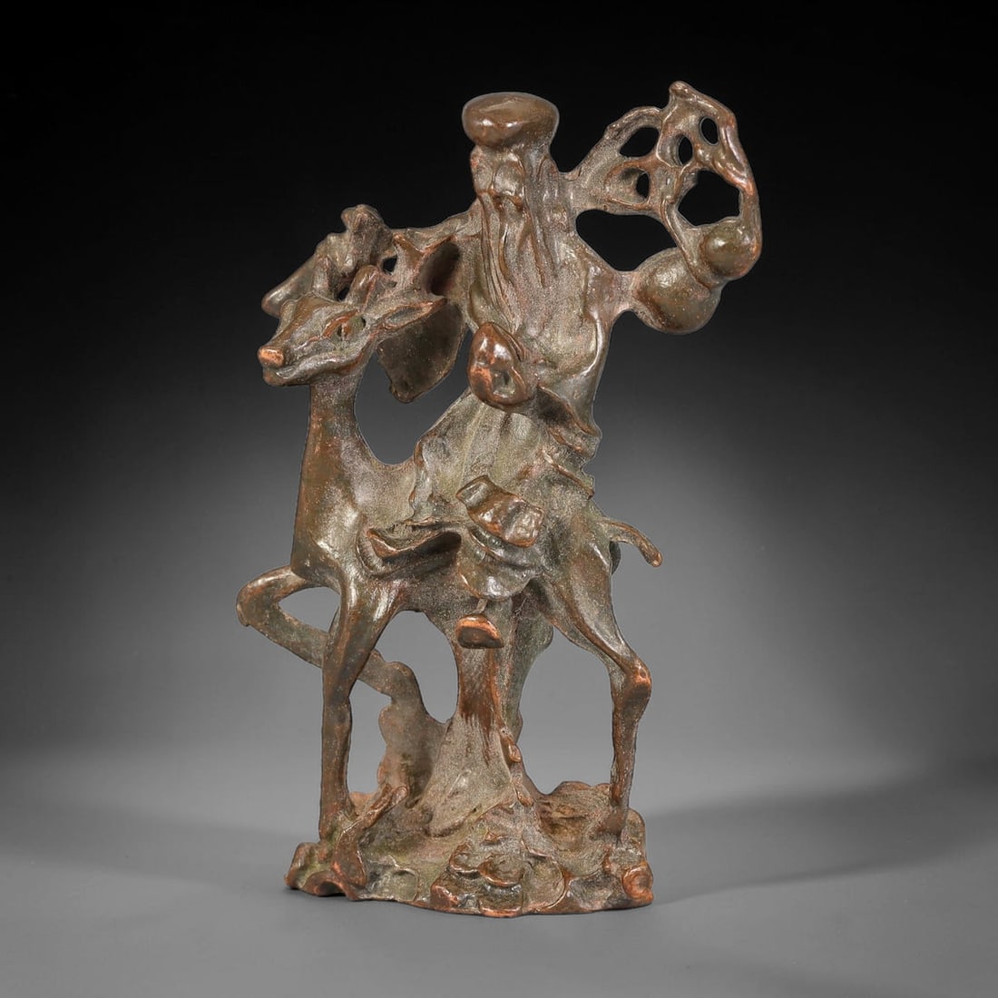 A Chinese Bronze Figural Group of Shouxing Riding a Deer, 43AX (1 of 2)