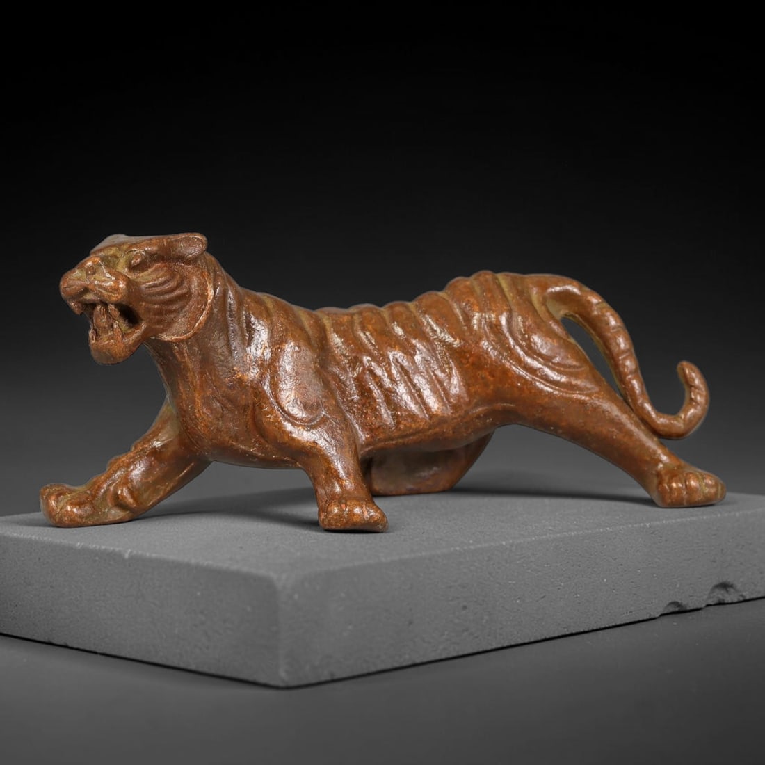 A Chinese Bronze Prowling Tiger Effigy Figurine, 31AX (1 of 2)