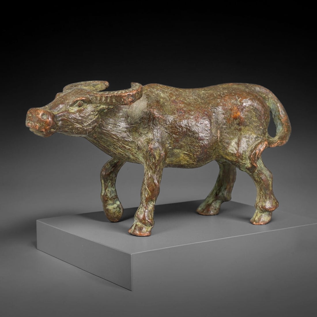 A Chinese Bronze Walking Buffalo Figurine, 66AX (1 of 3)