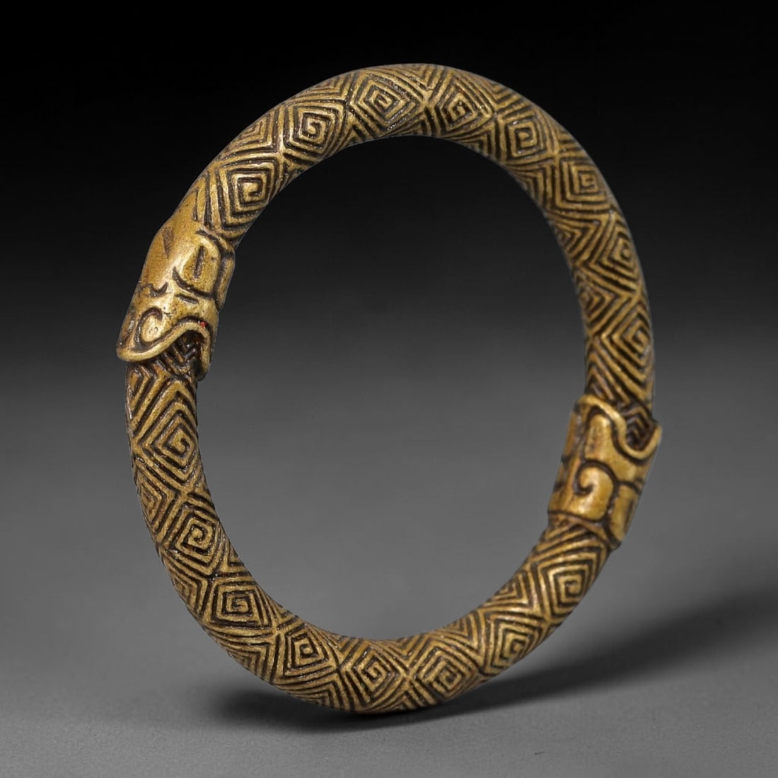 A Chinese Bronze Double Serpent Head Circular Amulet Ring, 58BD (1 of 2)