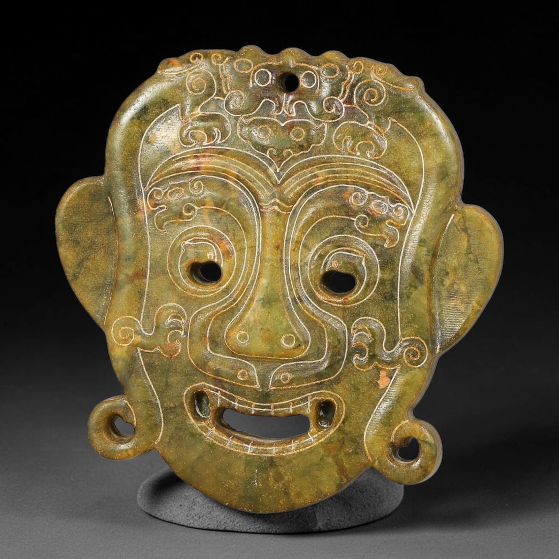 A Chinese Openwork Mottled Green Jade Anthropomorphic Mask Pendant, 34BD (1 of 2)