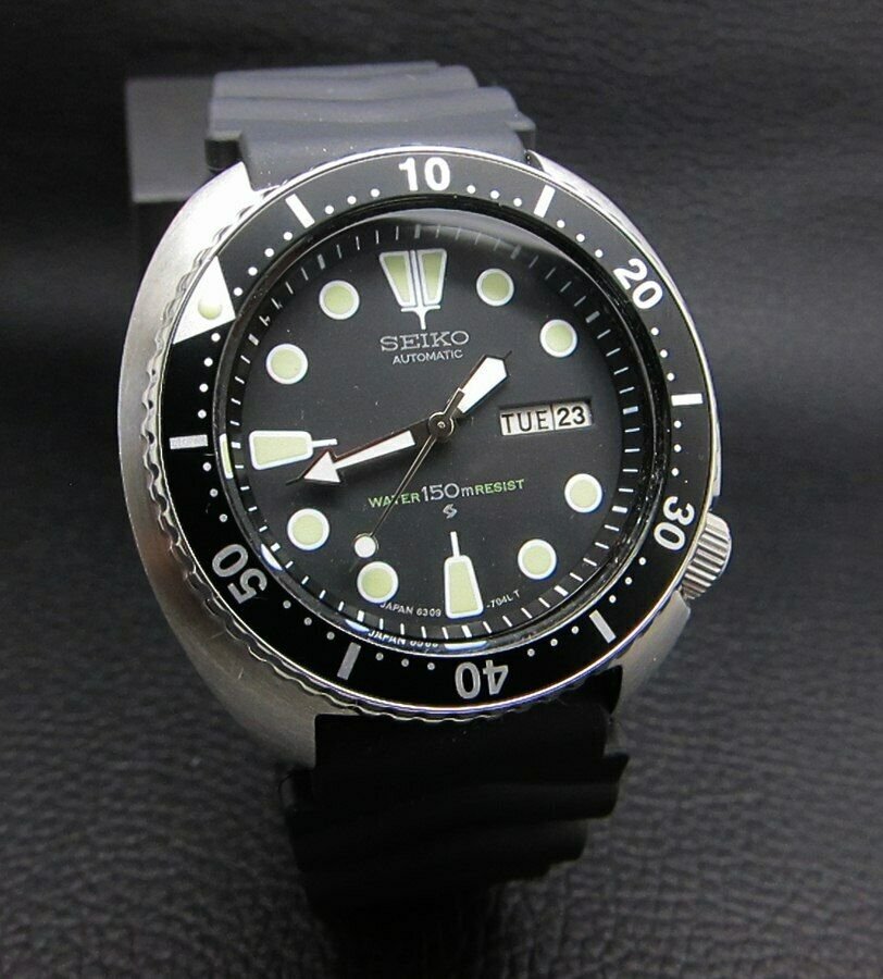 SEIKO TURTLE SCUBA 150M BIG 6309 DIVERS AUTOMATIC WATCH: SEIKO SCUBA 150M TURTLE AUTOMATIC Brand : Seiko - Fully Restored by Seiko Watch Japan Series : Turtle Scuba Movement : 6309 Japan Movement Case Material : Huge Stainless Steel Diameter with Crown : 43