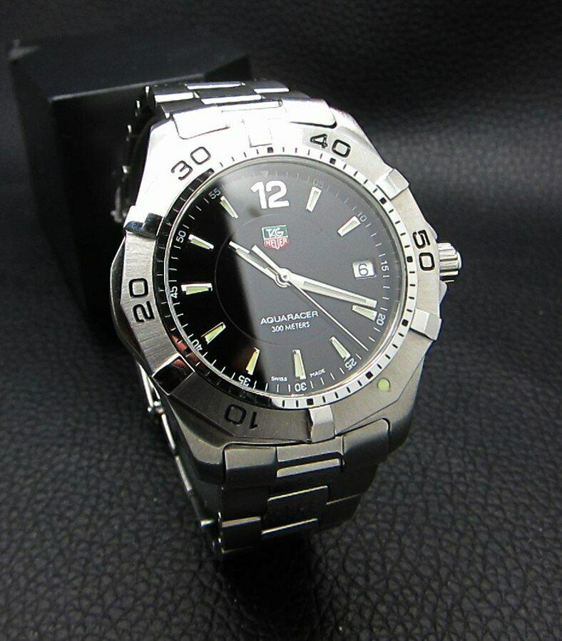 TAG HEUER AQUARACER 300M BLACK WAF1110 MEN: Condition : Good Condition - Brand : Tag Heuer Series : WAF1110 Professional AQUA RACER Movement : Tag Heuer Quartz Swiss Movement Case Material : Stainless Steel Diameter with Crown : 43 mm BIG CASE 