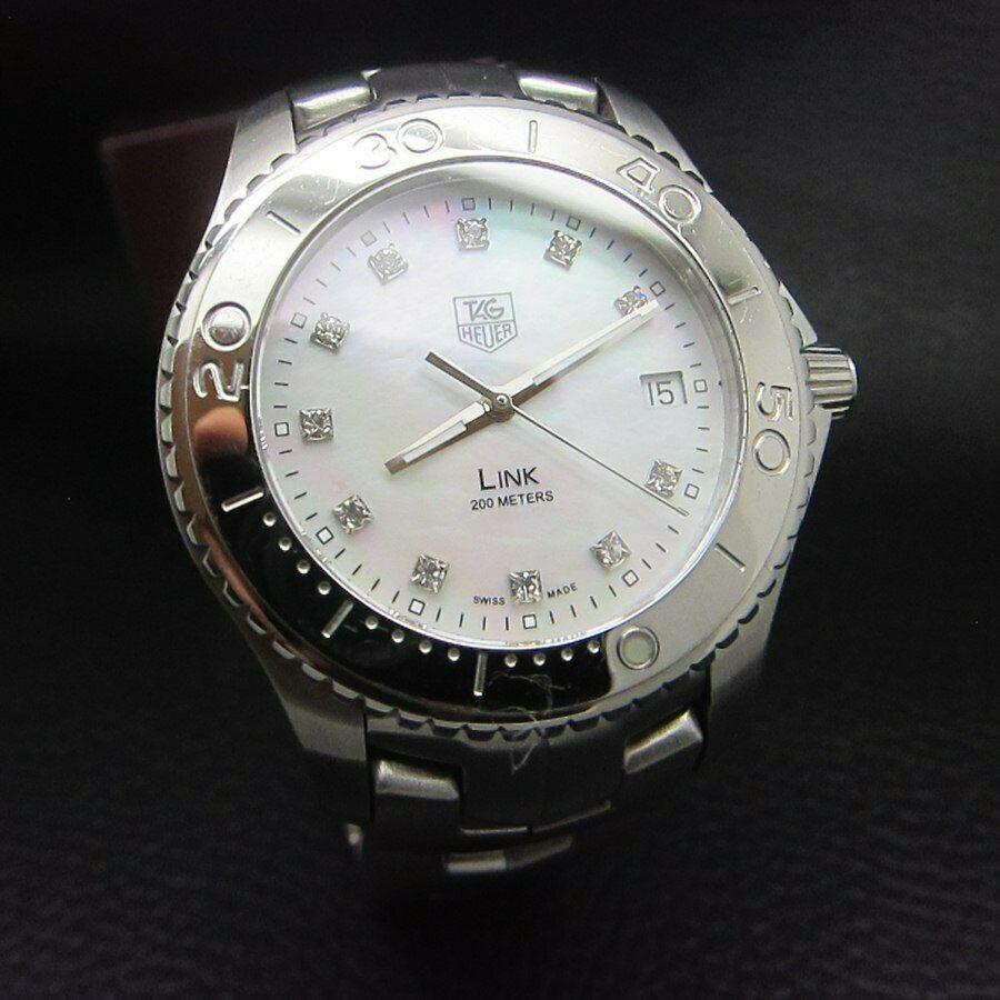 TAG HEUER LINK WJ1114 MOTHER OF PEARL SS DIAMONDS WATCH: Condition : Good Condition - Brand : Tag Heuer Series : Link Diamond Dial Version - WJ1114 Movement : Tag Heuer Quartz Swiss Movement Case Material : Stainless Steel Diameter with Crown : 43 mm BIG CA