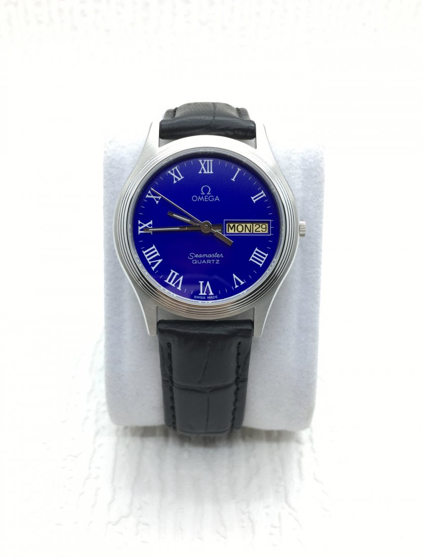 OMEGA SEAMASTER BLUE DIAL DAY DATE CAL 1425 SWISS: Condition - Fully Working Condition - Ticking Very Well Brand : OMEGA Series : Seamaster Movement : Quartz Cal.1425 Omega Case Material : Stainless Steel Diameter with Crown : 37 mm Case Thickness : 1