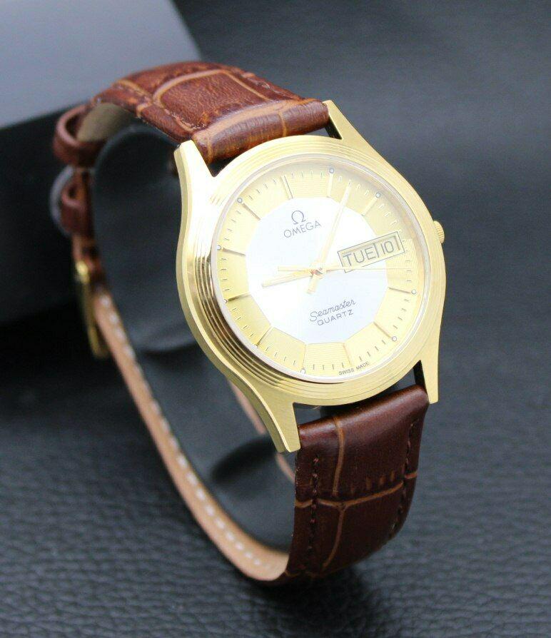 OMEGA SEAMASTER PAN PIE ROSE GOLD DAY DATE WATCH: OMEGA SEAMASTER PAN PIE ROSE GOLD DIAL DAY DATE CAL 1425 SWISS QUARTZ WATCH Condition - Fully Working Condition - Ticking Very Well Brand : OMEGA Series : Seamaster Movement : Quartz Cal.1425 Omega Ca