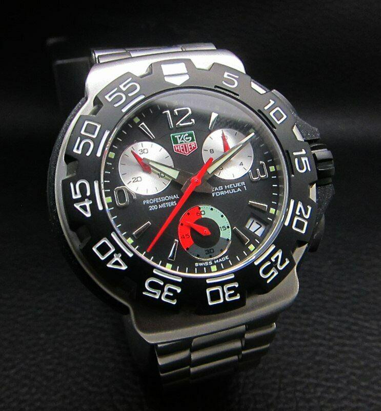 TAG HEUER FORMULA 1 CHRONOGRAPH CAC1110 BLACK WATCH: Condition : Good Condition - Brand : Tag Heuer Series : Chronograph Professional Formula 1 Movement : Tag Heuer Quartz Swiss Movement Case Material : Stainless Steel Diameter with Crown : 41 mm BIG CA