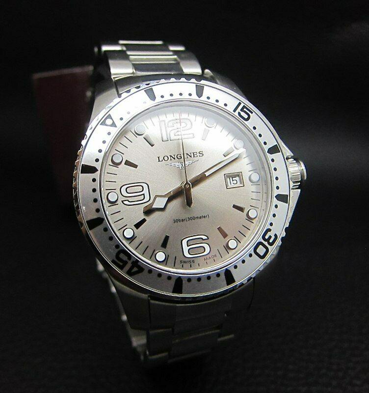 LONGINES HYDROCONQUEST SPORTS GREY QUARTZ SWISS WATCH: Condition : Good Condition Brand : Longines Series : HydroConquest Movement : Longines Quartz Swiss Movement Case Material : Stainless Steel - Diameter with Crown : 41 mm BIG CASE Dial Color : Grey Lo
