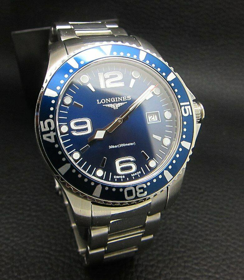 LONGINES HYDROCONQUEST BLUE QUARTZ SWISS WATCH: Condition : Good Condition Brand : Longines Series : HydroConquest Movement : Longines Quartz Swiss Movement Case Material : Stainless Steel - Silver Tone Diameter with Crown : 41 mm BIG CASE Dial Col