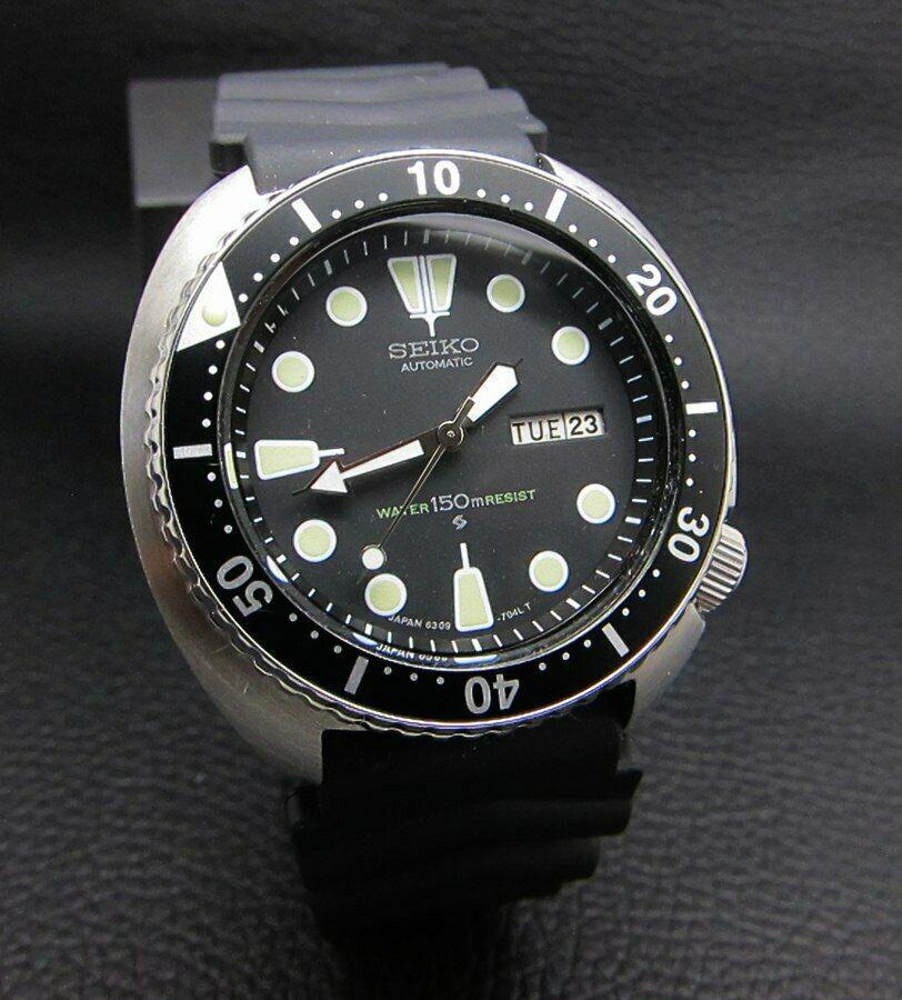 SEIKO TURTLE SCUBA 150M BIG 6309 DIVERS AUTOMATIC WATCH: SEIKO SCUBA 150M TURTLE AUTOMATIC Brand : Seiko - Fully Restored by Seiko Watch Japan Series : Turtle Scuba Movement : 6309 Japan Movement Case Material : Huge Stainless Steel Diameter with Crown : 43