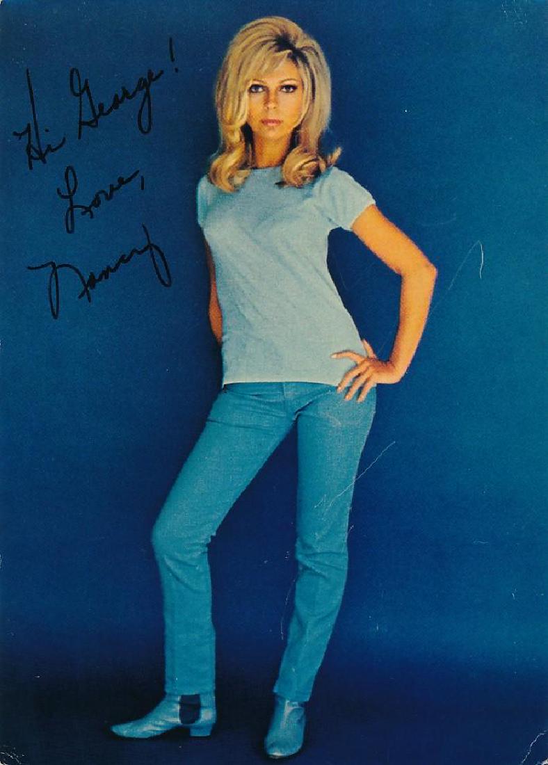 Nancy Sinatra- 5 x 7 Color card stock photo signed: Nancy Sinatra- 5 x 7 Color card stock photo signed w/COA. A signed Color card stock photograph signed and inscribed by Nancy Sinatra. Comes with COA