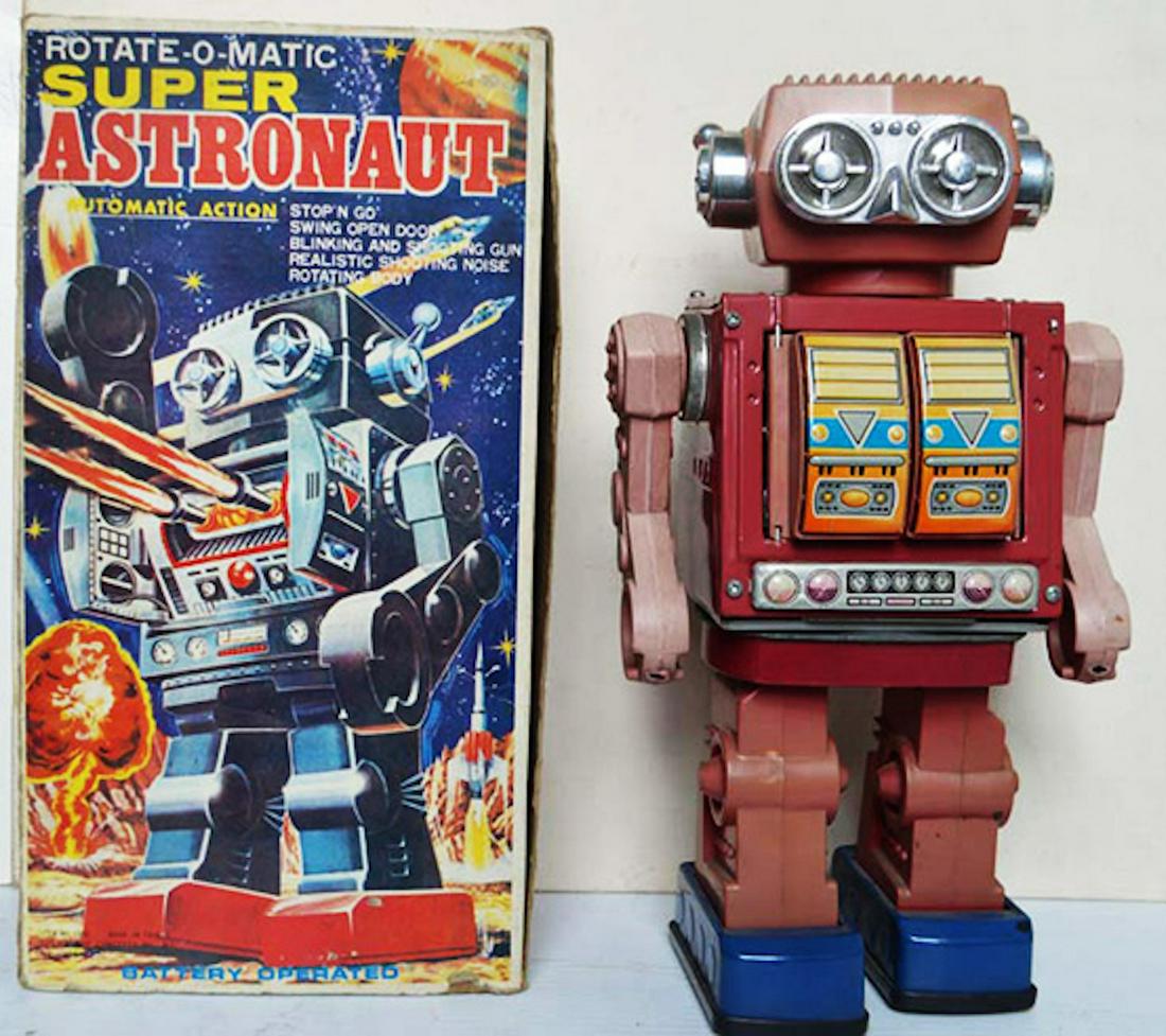 ROTATE-O-MATIC SUPER ASTRONAUT AUTO ACTION ROBOT: ROTATE-O-MATIC SUPER ASTRONAUT AUTO ACTION ROBOT. BATTERY OPERATED. FEATURES: STOP AND GO ACTION, SWING OPEN DOOR, BLINKING AND SHOOTING GUN, REALISTIC SHOOTING NOISE, AND TORATING BODY. TESTED AND WO