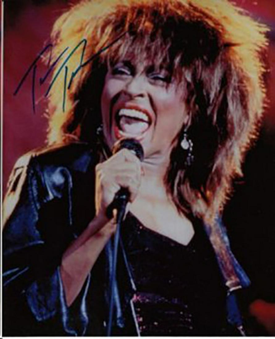 TINA TURNER AUTHENTIC SIGNED 8 X 10 PHOTOGRAPH: TINA TURNER AUTHENTIC SIGNED 8 X 10 PHOTOGRAPH. THIS ITEM HAS BEEN INSPECTED AND AUTHENTICALLY VERIFIED BY ENCORE AUTOGRAPHS. IT IS NOT A COPY, REPRINT, OR ANY KIND OF FACSIMILE OF THE ARTIST'S AUTOGR