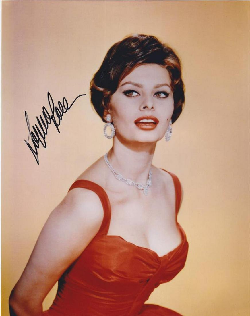Sophia Loren - 8 x 10 Signed Photograph w/COA: Sophia Loren - 8 X 10 Signed Photograph W/COA. A color glossy photograph signed in black felt tip ink by Sophia Loren. In good condition. Comes with COA from Todd Mueller Autographs