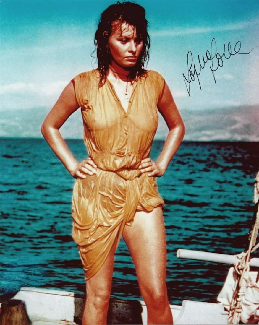 SOPHIA LOREN SIGNED 8 X 10 PHOTOGRAPH: SOPHIA LOREN SIGNED 8 X 10 PHOTOGRAPH. THIS ITEM HAS BEEN INSPECTED AND AUTHENTICALLY VERIFIED BY DEE'S SIGNED TREASURES. IT IS NOT A COPY, REPRINT, OR ANY KIND OF FACSIMILE OF THE ARTIST'S AUTOGRAPH.