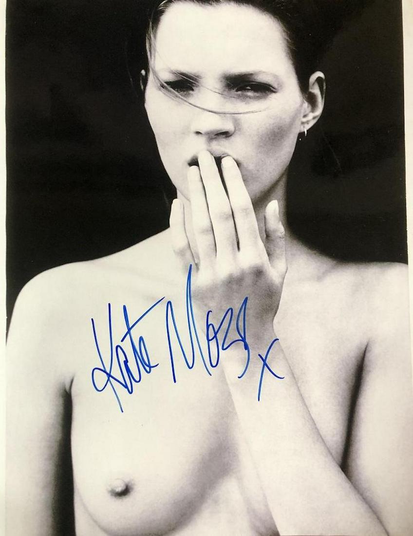 Kate Moss- Topless 11 X 14 signed photograph w/COA: Kate Moss- Topless 11 X 14 signed photograph w/COA. A B&W topless photograph signed in full in blue felt tip ink nicely by Kate Moss. Comes with a second COA from Odyssey Group. In very good condition