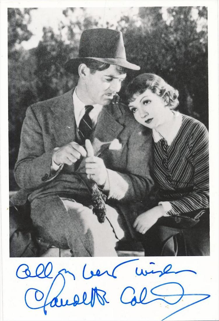 Claudette Colbert- Glossy signed 5 x 7 photograph w/COA: Claudette Colbert- Glossy signed 5 x 7 photograph w/COA. B&W Glossy photograph of Claudette Colbert with Clark Gable signed in the lower margin in blue felt tip ink, "All my best wishes, Claudette Col
