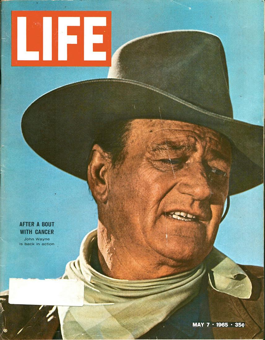 1965 LIFE Magazine w/ John Wayne on the Front Covered: 1965 LIFE Magazine w/ John Wayne on the Front Covered. This is a fulled and complete LIFE Magazine issue dated May 7, 1965. The front cover has "2 slash lines" (see photo). Otherwise, it is in fine go