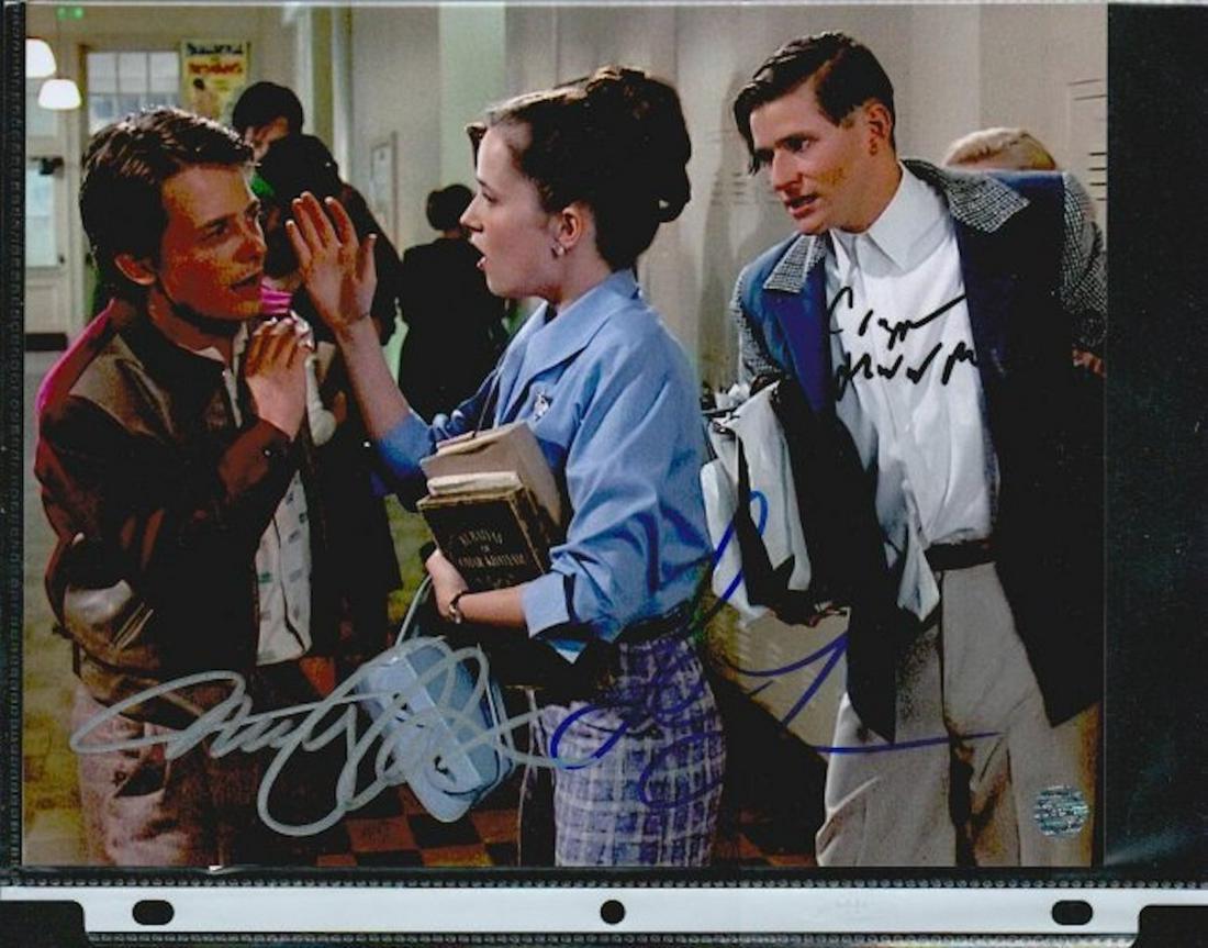MICHAEL J FOX, LEA THOMPSON, & CRISPIN GLOVER SIGNED 8: MICHAEL J FOX, LEA THOMPSON, & CRISPIN GLOVER SIGNED 8 X 10 PHOTOGRAPH. THE AUTHENTICITY OF THIS ITEM IS GUARANTEED BY HOLLYWOOD TO YOU.