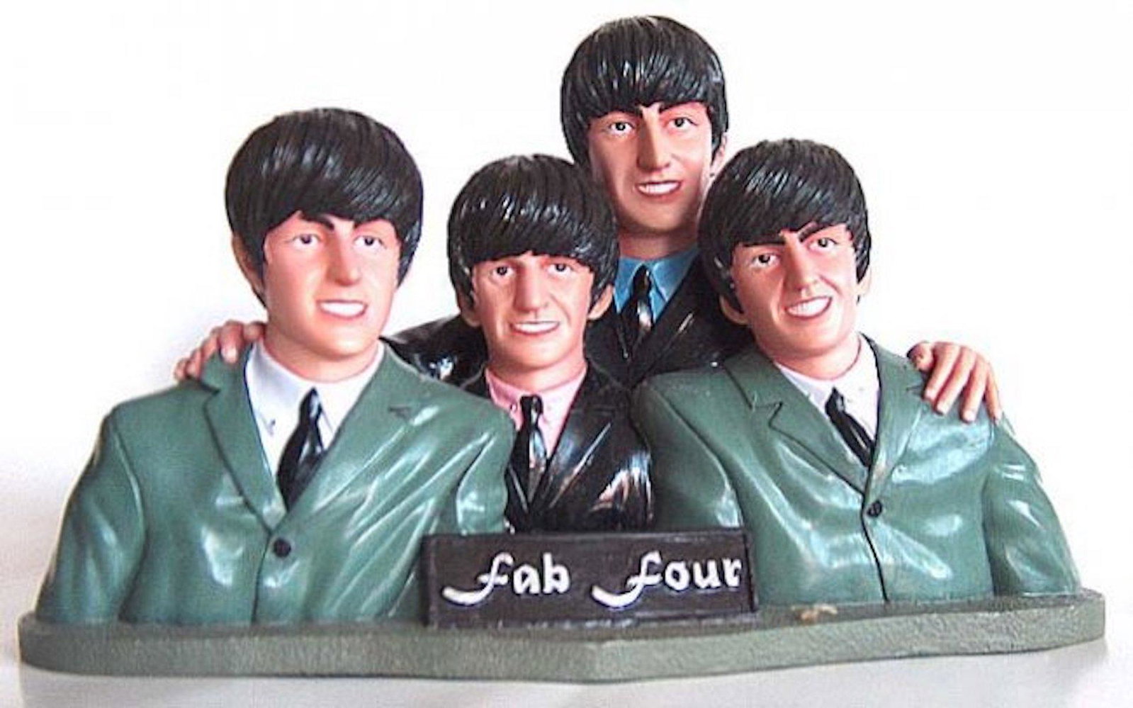 THE BEATLES COLD CAST MODEL: THE BEATLES COLD CAST MODEL. ABOUT 9 INCH LONG AND 5 INCH TALL PRODUCED IN CHINA WAS REMOVED FROM THE MARKET AROUND 1990'S. THIS IS RARE BEATLES MEMORABILIA. MINT CONDITION