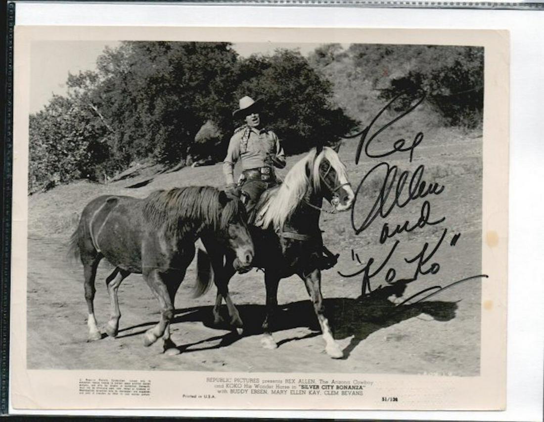 REX ALLEN SIGNED 8 X 10 PHOTOGRAPH W/COA: REX ALLEN SIGNED 8 X 10 PHOTOGRAPH W/COA. HERE IS A B/W GLOSSY PHOTOGRAPH. COMES WITH A CERTIFICATE OF AUTHENTICITY FROM TODD MUELLER AUTOGRAPHS
