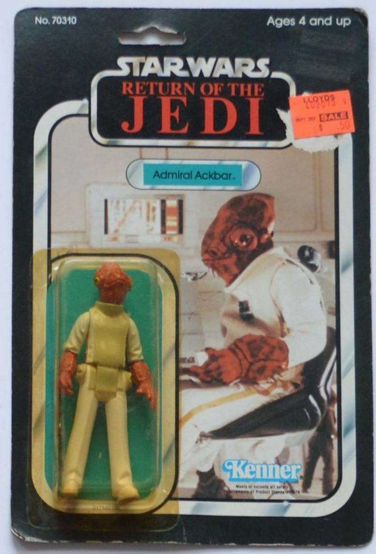 STAR WARS ROTJ ADMIRAL ACKBAR ACTION FIGURE ON CARD: STAR WARS ROTJ ADMIRAL ACKBAR ACTION FIGURE ON CARD. THE CARD IS PUNCHED ON THE TOP (SEE PICTURE). THERE IS ALSO PRICE STICKER AFFIXED ON THE CARD (SEE PICTURE). COMPLETE AND INTACT. 1983, BY KENNER. 