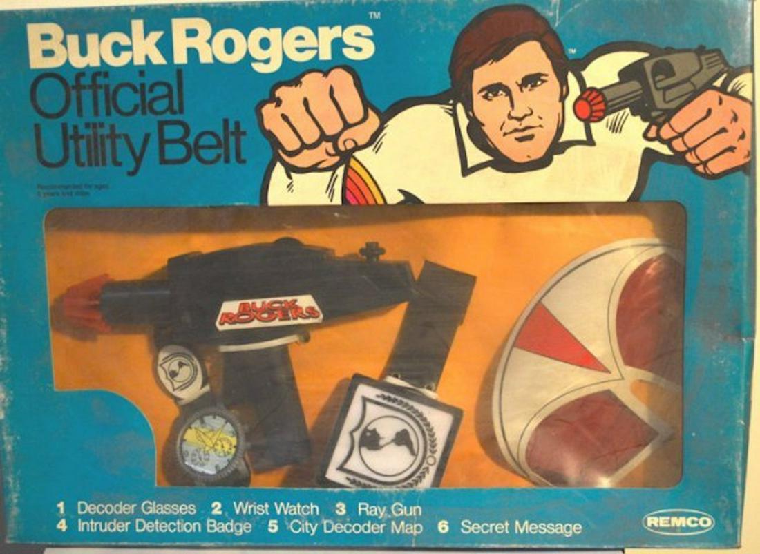 BUCK ROGERS OFFICIAL UTILITY BELT: BUCK ROGERS OFFICIAL UTILITY BELT. CONTENTS: DECODER GLASSES, WRIST WATCH, RAY GUN, INTRUDER DETECTION BADGE, CITY DECODER MAP.MINT IN BOX. BOX SHOW MINOR WEAR (SEE PICTURES)