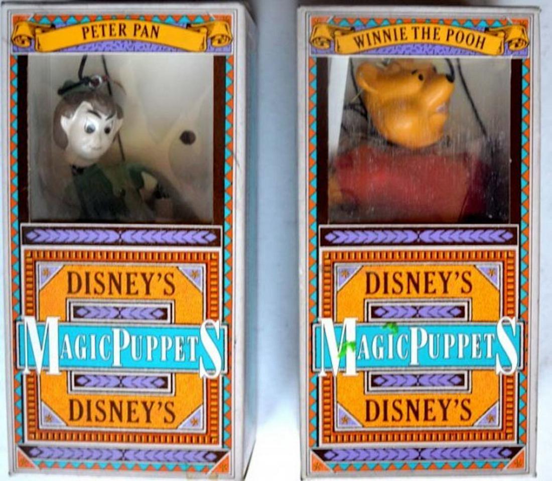2 DISNEY'S MAGIC PUPPETS "PETER PAN" & "WINNIE THE POOH: 2 DISNEY'S MAGIC PUPPETS "PETER PAN" & "WINNIE THE POOH". MEASURES AT 5" TALL. COMPLETE AND INTACT.