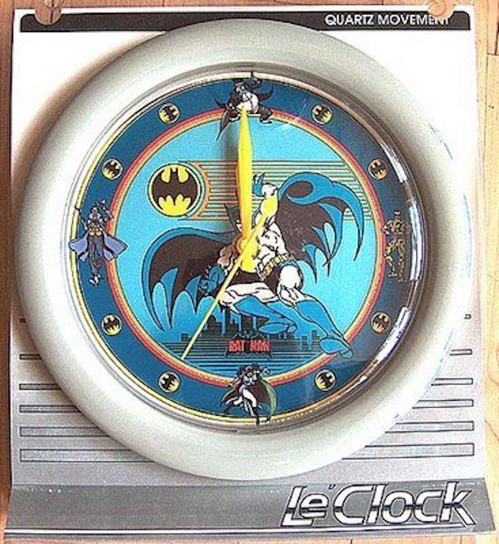 BATMAN rare limited production 9 inch quartz clock: BAT MANrare limited production 9 inch BATMAN quartz clock sweet shoppeTM, by ELECTRO OPTIX INC.made in the USA, TM and [c] 1989 DC COMICS. with beautiful graphic including the 4 villainsat 12 is the p