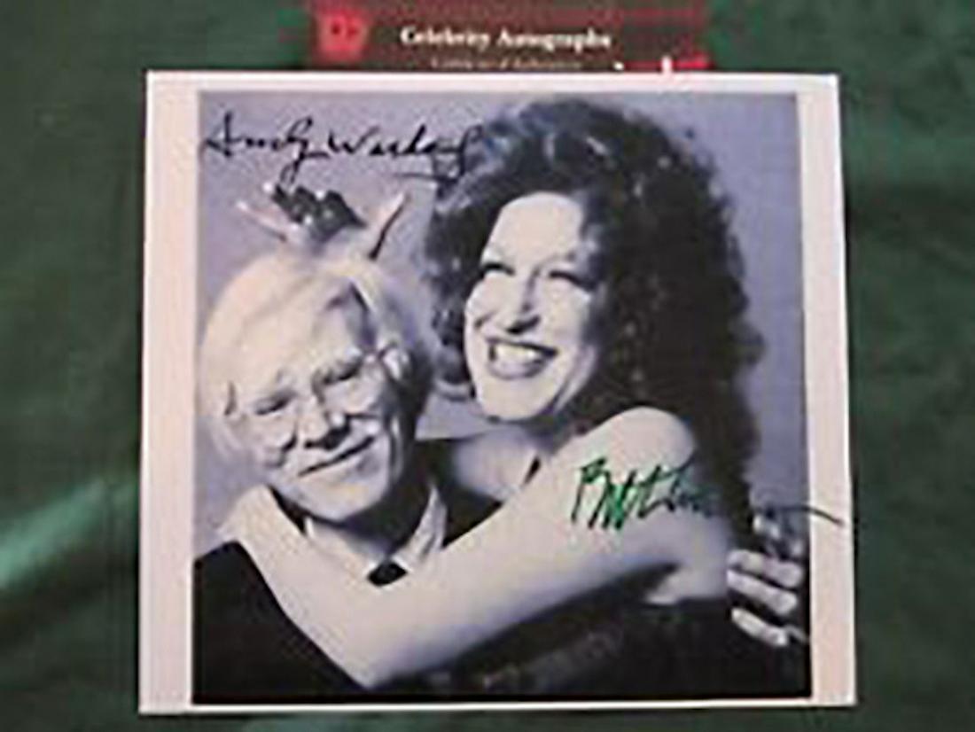 BETTE MIDLER & ANDY WARHOL - 8 X 10 PHOTOGRAPH: BETTE MIDLER & ANDY WARHOL - 8 X 10 PHOTOGRAPH. AUTHENTIC SIGNED PHOTOGRAPH OF BETTE MIDLER & NDY WARHOL. COMES WITH COA