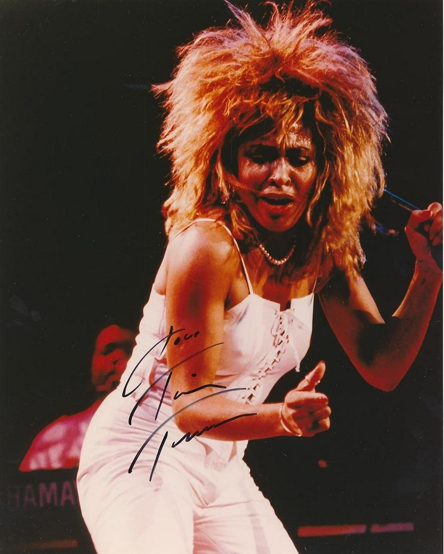 Tina Turner- 8 x 10 Color Glossy signed photograph: Tina Turner- 8 x 10 Color Glossy signed photograph w/COA. Color Glossy photograph signed in black felt tip ink, "Love, Tina Turner." From the Roarty collection. In very good condition.