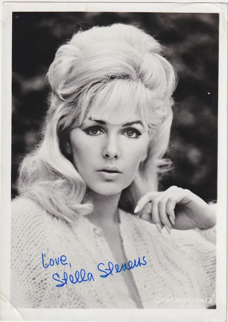 Stella Stevens - Signed 5 x 7 Photograph w/COA: Stella Stevens - Signed 5 x 7 Photograph w/COA. A black and white glossy photograph signed in blue felt tip ink by Stella Stevens. Bending in the photograph and wear in the corners, but otherwise in f