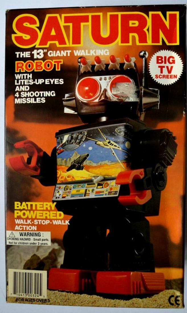 SATURN "THE 13" GIANT WALKING ROBOT" WITH LITES-UP EYES: SATURN "THE 13" GIANT WALKING ROBOT" WITH LITES-UP EYES AND 4 SHOOTING MISSILES. BATTERY OPERATED. WALK-STOP-WALK ACTION.