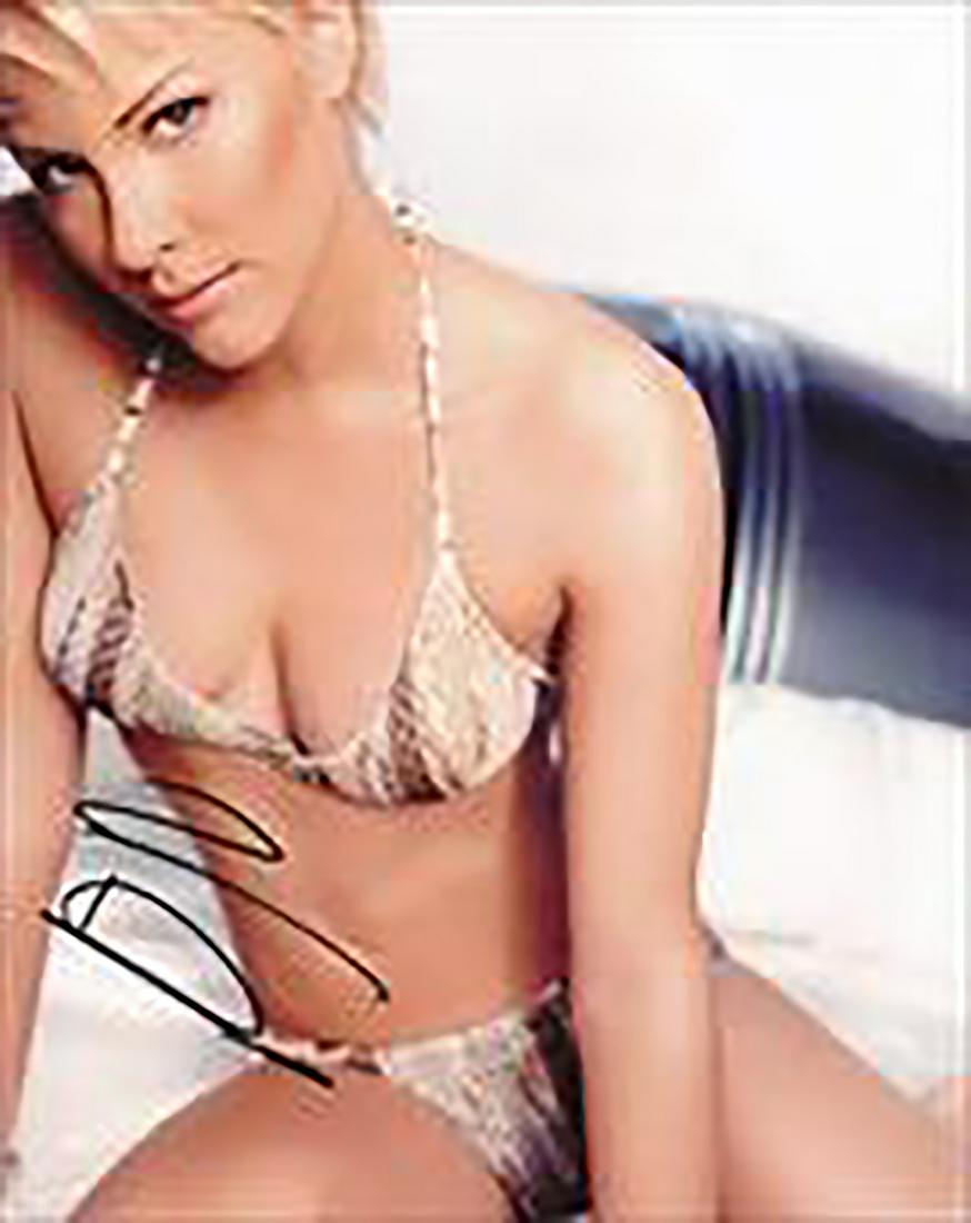 Britanny Daniel - 8 x 10 Signed Photograph w/COA: Britanny Daniel - 8 x 10 Signed Photograph w/COA. A signed color glossy sexy photograph of Brittany Daniel. Signed by her in black felt tip ink. Comes with COA from Todd Mueller Autographs