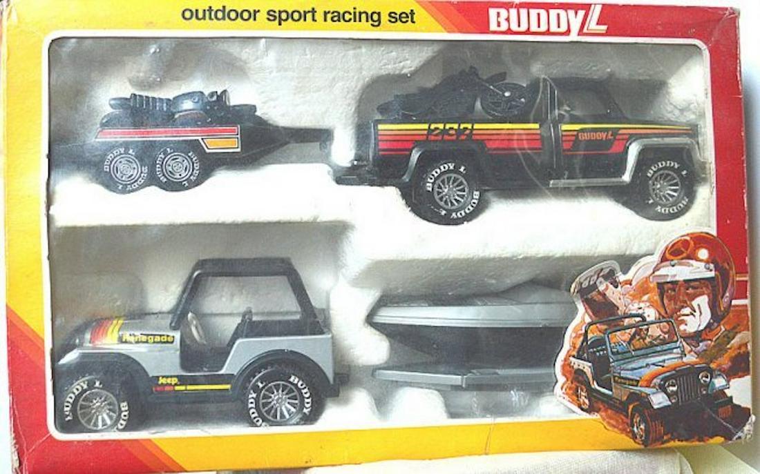 BUDDY L OUTDOOR SPORT RACING SET: BUDDY L OUTDOOR SPORT RACING SET. SET INCLUDES TWO SPEED RACING BIKES, RENEGADE JEEP, SPEED BOAT, AND A TRUCK. ITEMS ARE MADE OF STURDY STEEL AND DURABLE PLASTIC. MINT IN BOX. COMPLETE AND INTACT. BOX