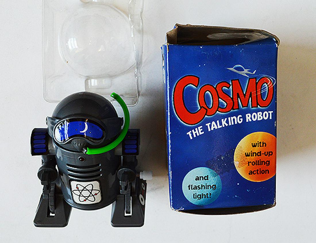 COSMO "THE TALKING ROBOT": COSMO "THE TALKING ROBOT" . FEATURES WIND-UP ROLLING ACTION. FLASHING LIGHT. NEVER USED